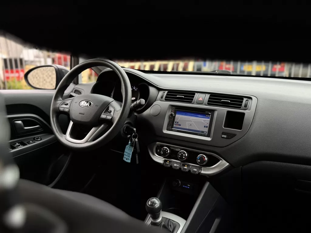 Kia Rio 1.2 CVVT Comf. Pack Airco Navi Lmv BT Nap Kia Rio 1.2 CVVT Comf. Pack Airco Navi Lmv BT Nap