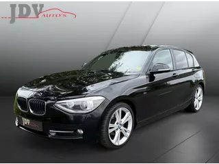 BMW 1-serie 116i airco pano trekhaak leder