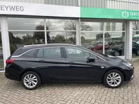 Opel Astra Sports Tourer 1.0 T. Business Ex.Nav, Carplay, El kofferbak Foto